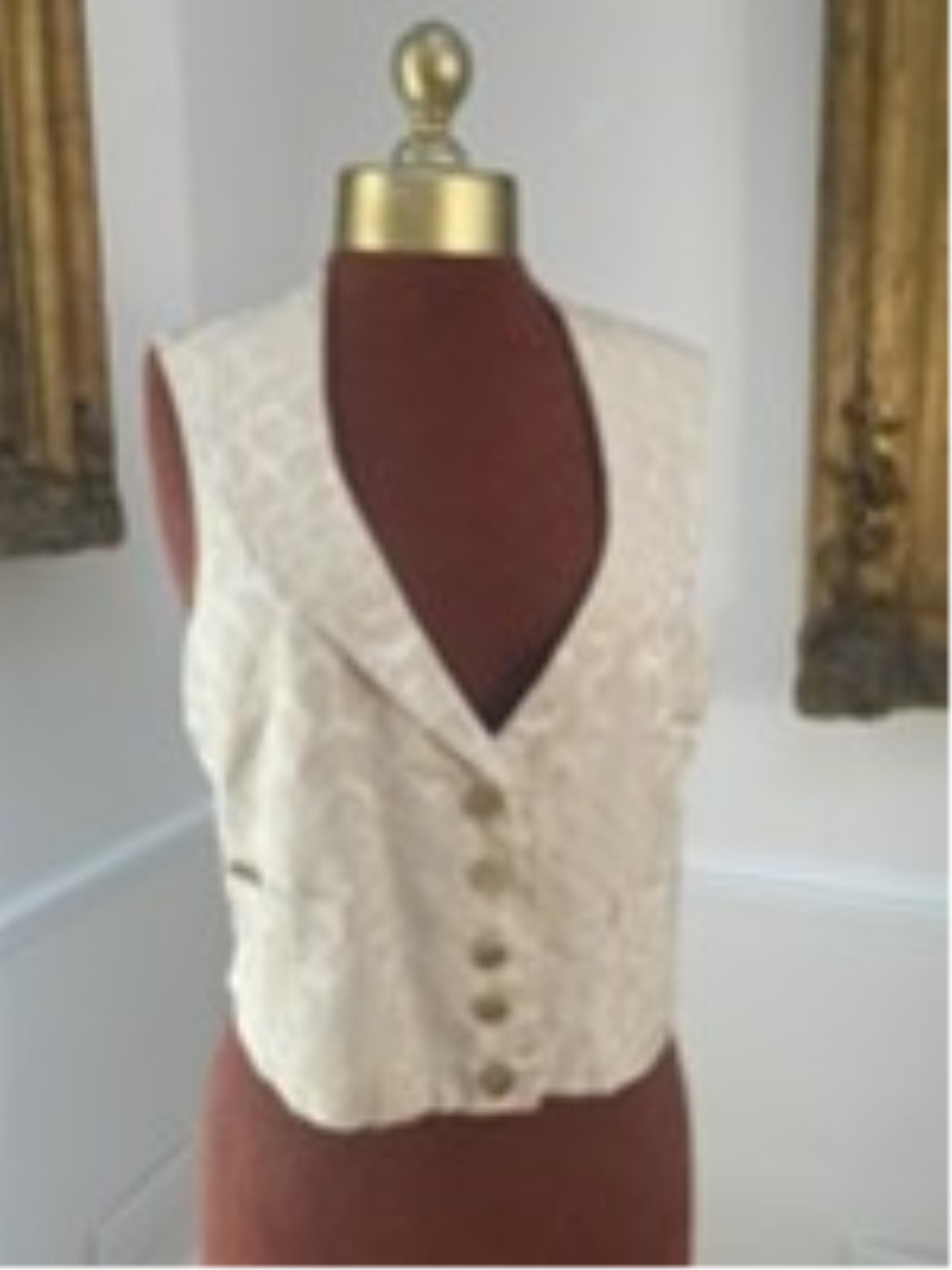 Four silk and brocade waistcoats (one red and three white/cream)